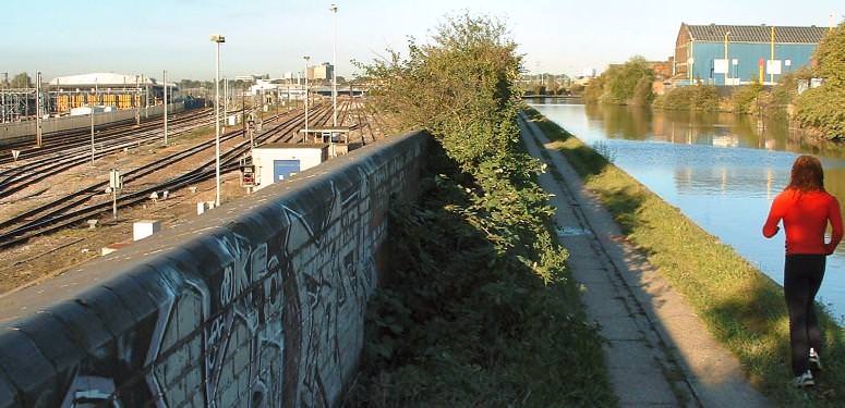 Railway sidings can be seen for miles from the towpath at Old Oak