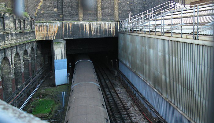 Kings Cross Bridge showing the structure in which the Fleet River/Sewer runs over the railway as well as beneath Kings Cross Bridge itself