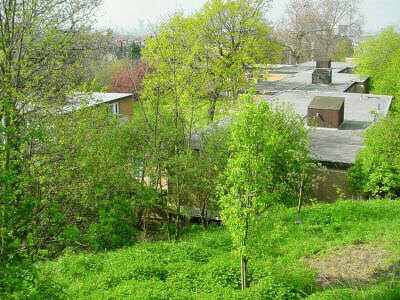 View down New Cross Lock flight site towards station